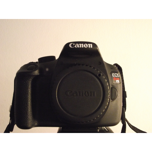 Canon camera photographed from the front after local SwinIR enhancement